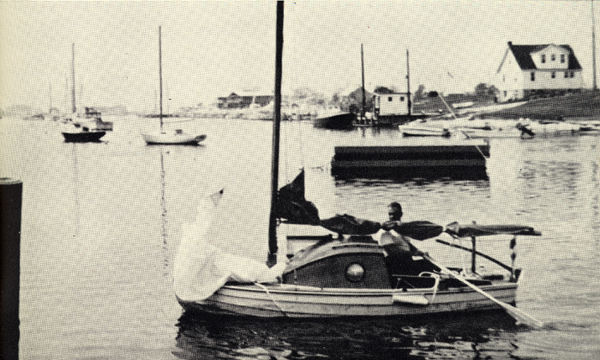 Photo of Manry rowing Tinkerbelle to mooring
