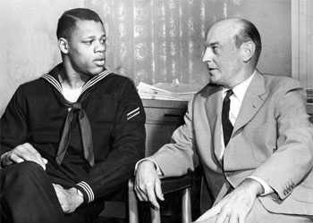 Coach Paul Brown with rookie Milt Campbell, 1957