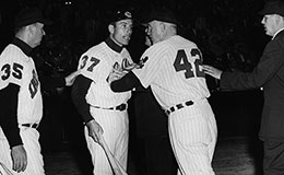 Jimmy Piersall being restrained by Indians pitching coach Red Kress.