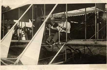 A.I. Root at the Medina County Fair in a Wright brothers airplane, 1915