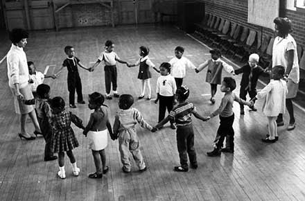 Children play games at Friendly Inn Settlement House, 1967