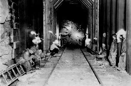 Collapse of Harrisville Tunnel - W&LE Railroad caboose no. 8 under rubble, 1930.