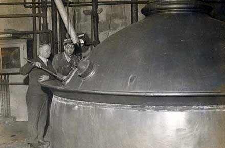 Workers at brew kettle inside the Cleveland Home Brewing Company