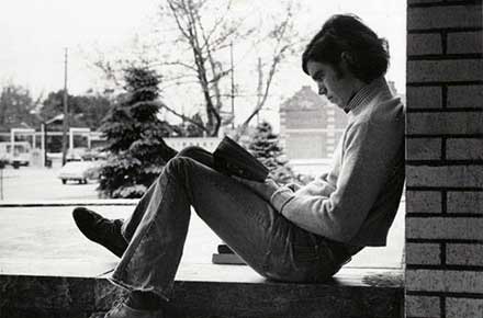 Young man reading in the browsing room, 1977