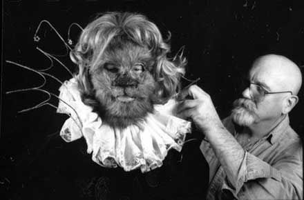 Eugene Hare puts the finishing touches on The Beast, played by Wayne Schaeffer.