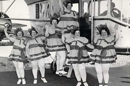 260-pound ballerinas posing with the Goodyear blimp