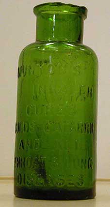 Green medicine bottle.