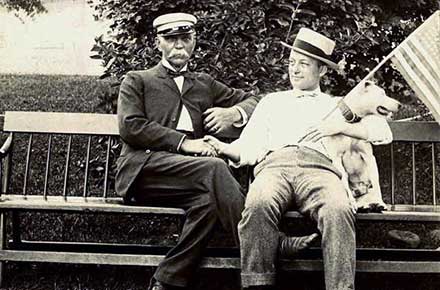 Two unidentified men on a bench