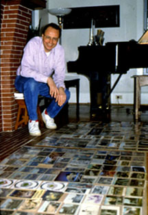 Walter Leedy in front of a display of his postcards