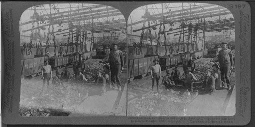 Docks, switchyards and 1-ton buckets for lifting iron ore from ships to cars, Cleveland, Ohio.